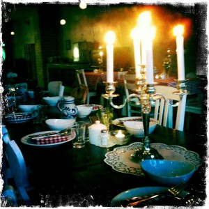 candle lit on a dinner table