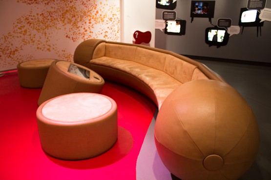 Sausage shaped couch in the Currywurst Museum in Berlin with Red carpet