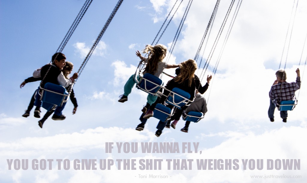 children on swings happy with the quote from Toni Morrison in text across the bottom "If you wanna fly, you got give up the shit that weighs you down"