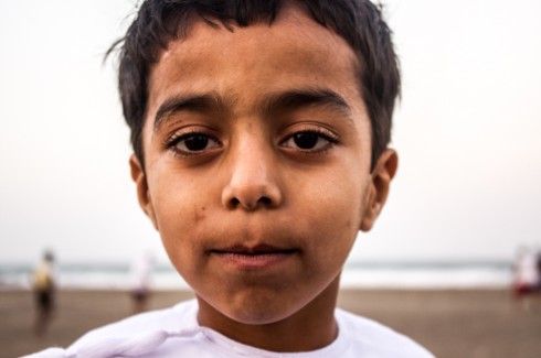 Young Omani boy staring into camera