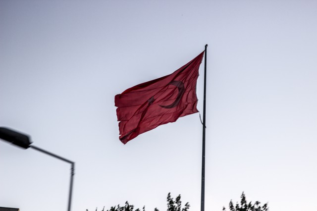 red flag on a pole