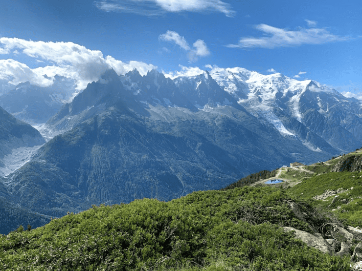 Snow covered Alps Mountain Range on The Tour du Mont Blanc Trail with blue sky