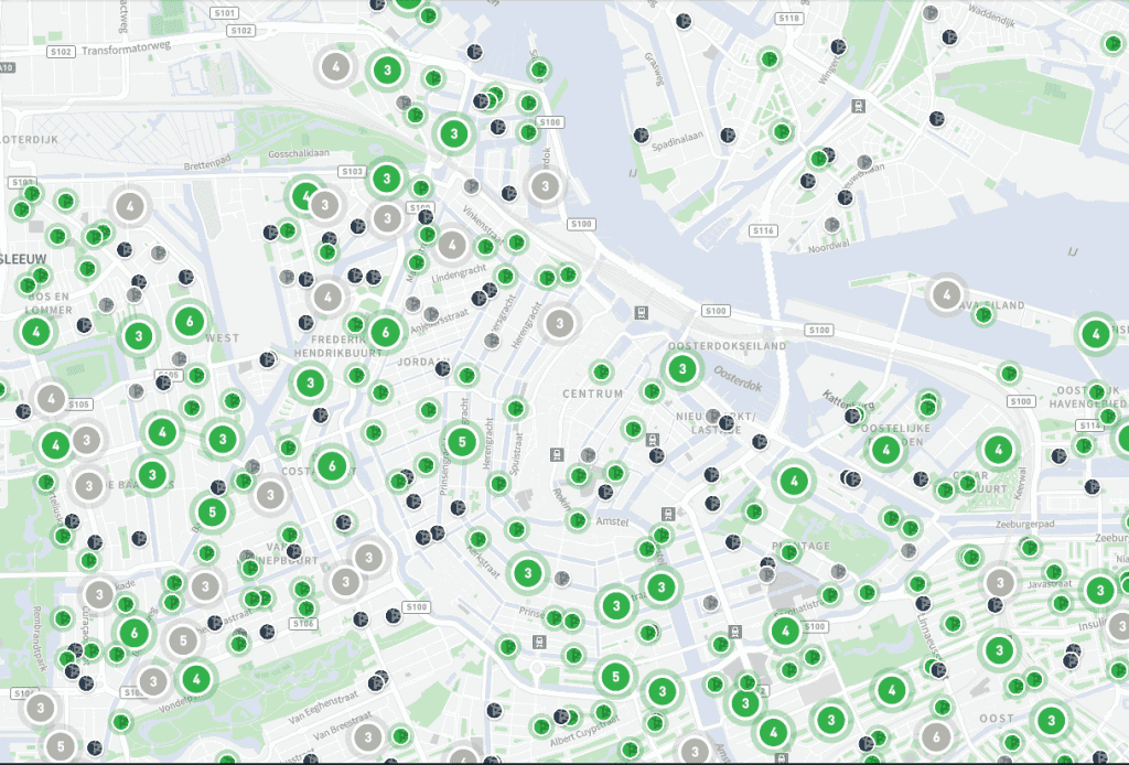 hundreds of green dots across a map of Amsterdam showing all the available options of Car Sharing Amsterdam cars with MyWheels