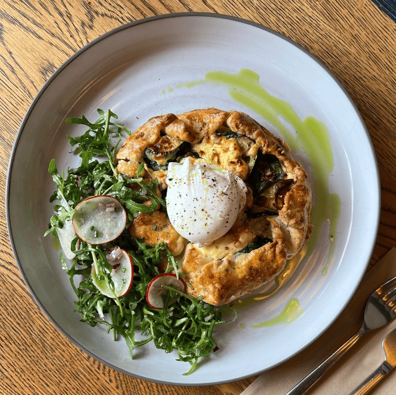 Baked Pie with side salad of greens at Box Sociaal