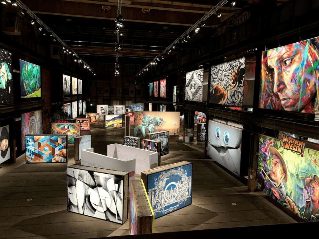 Large billboard size Street art murals of various colors at the Straat museum - Amsterdam's hidden gem