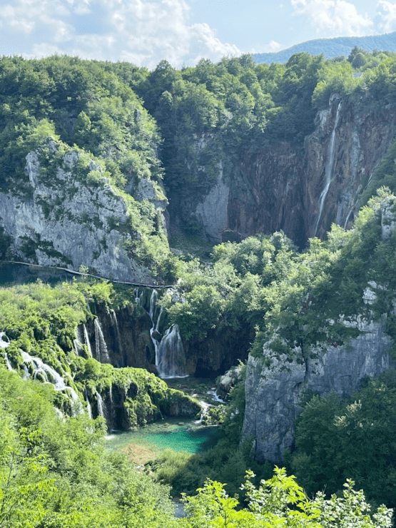 Waterfalls cascading over multiple levels of rock formations at Plitvice Lakes National Park
