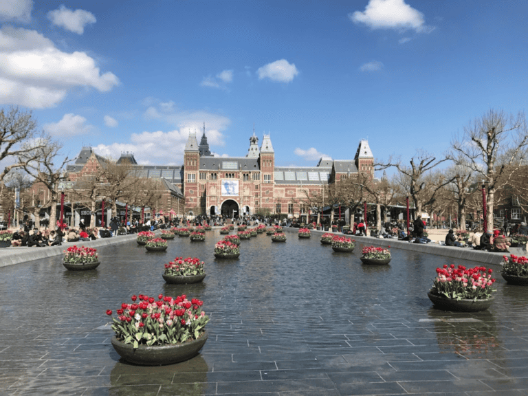 Rijks Museum with tulips across the water