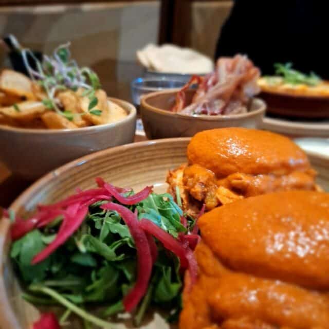 Butter Chicken Benedict at Miri Mary in Amsterdam for brunch