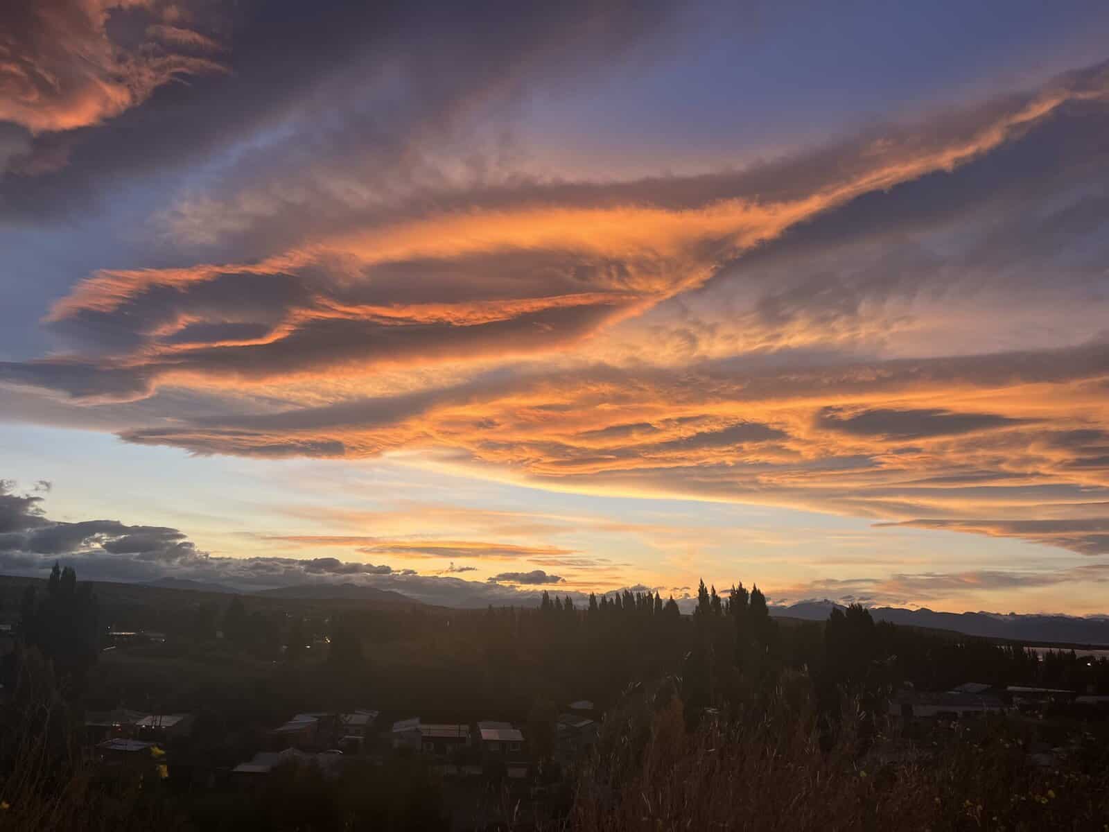 Sunset with Pink, Purple and Blue Clouds over El Calafate Town